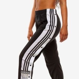 الاتجاه adidas button side pants 